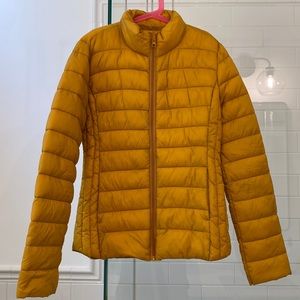 Never worn, super cute mustard color light weight jacket with pack bag